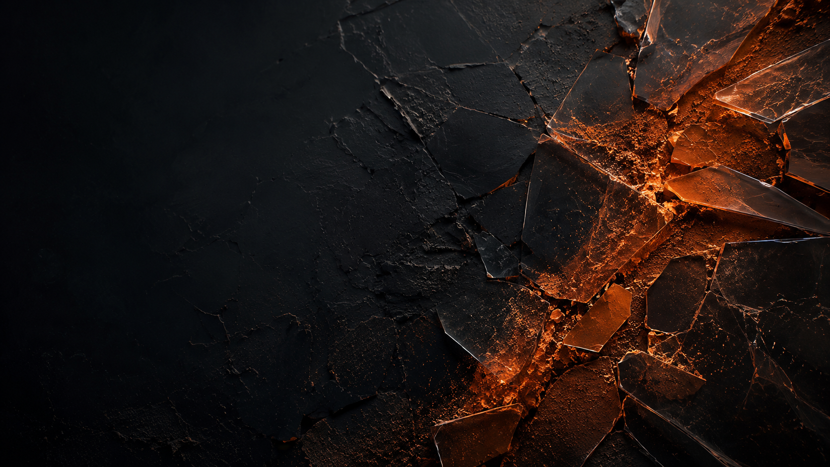 A dark textured surface breaking open with an ember-orange seam.